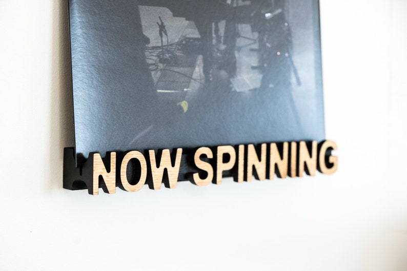 Vinyl record display "Now spinning"