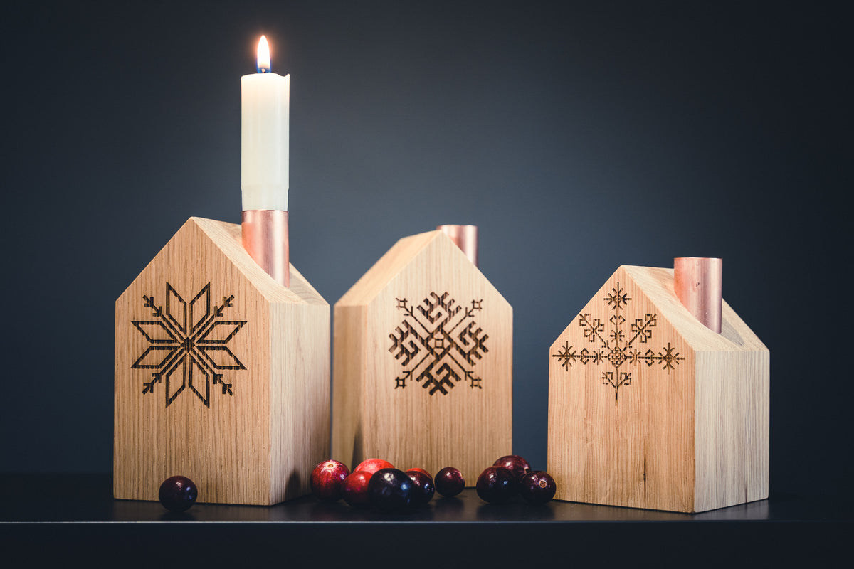 Oak house candle holders with Latvian symbols